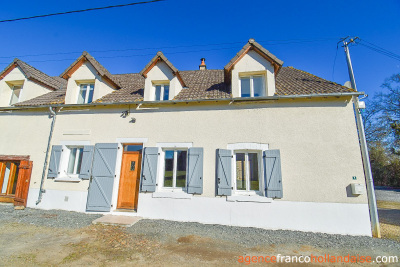 Huis met gîte en diverse schuren