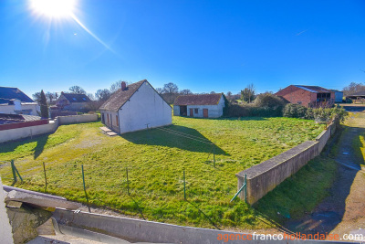 Huis met gîte en diverse schuren