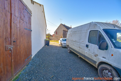 Huis met gîte en diverse schuren