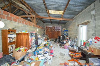 Huis met gîte en diverse schuren