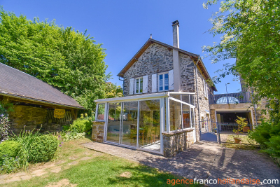 Twee woningen met een parktuin