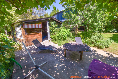 Twee woningen met een parktuin